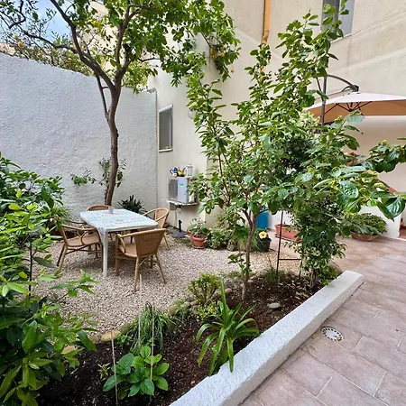Flowered House With Garden *