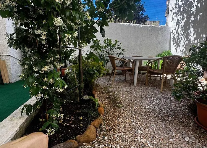 Flowered House With Garden